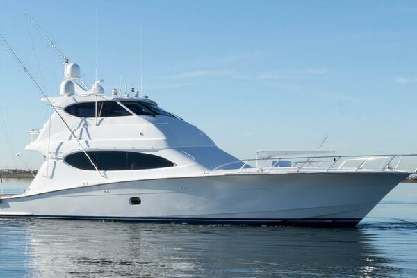 2006 HATTERAS 68 ENCLOSED BRIDGE